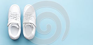 White sneakers on a blue background