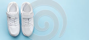 White sneakers on a blue background