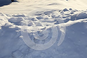 Snow bank-close up of white texture of real snow for winter back grounds photo