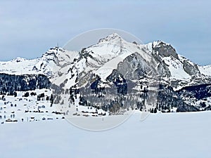 White snow caps on the alpine peaks SÃ¤ntis (Santis or Saentis)