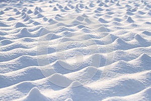 White snow on feild in sunlight