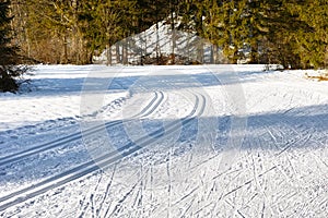 White snow field with ski trails winter season patterns