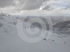 White snow mountain rocks in alps day time