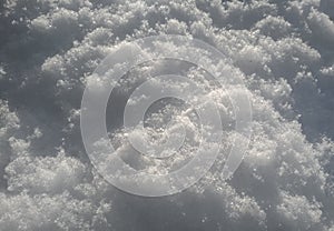 White snow surface background - top view of fresh snow texture on the ground