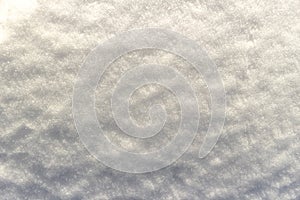 White snow surface with gradient shadows