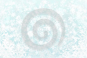 White snowflake falling on a blue background. Gradient effect