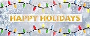 White snowflake greetings text Christmas banner with lights