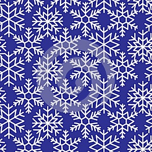 White snowflakes on blue background seamless vector pattern. Repeating Christmas Wintertime Hanukkah backdrop. Illustration Winter