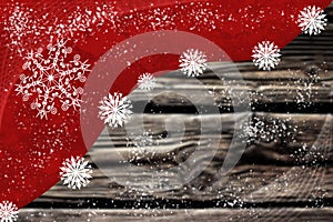 White snowflakes on dark red background beside