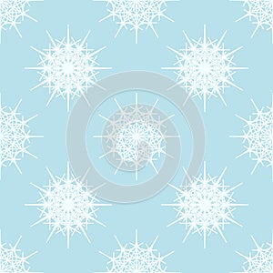 White snowflakes on light blue background. Vector