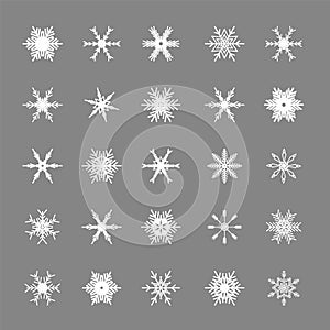 White snowflakes set isolated on gray background. Snow elements for Happy New Year and Merry Christmas holidays greeting