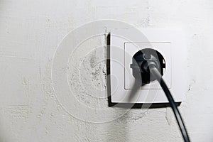 White socket with black plug