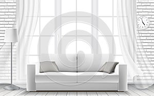 White sofa large window in a brick wall