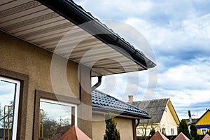 White soffit for providing optimal ventilation for roof overhangs photo