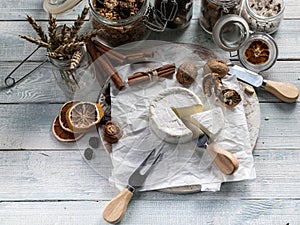 White soft cheese camembert on wooden background