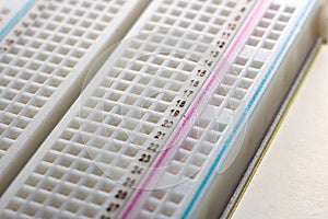 White solderless breadboard close up, view from above