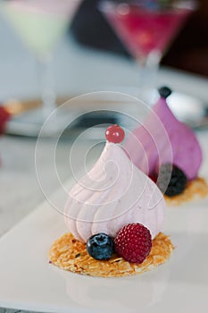 White soufle cake on white ceramic plate at restaurant.