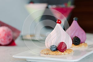 White soufle cake on white ceramic plate at restaurant.