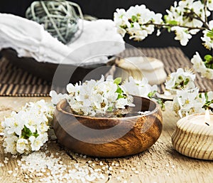 White Spa Flower Blossom in a Wooden Water Bowl.Beautiful Spa Tr