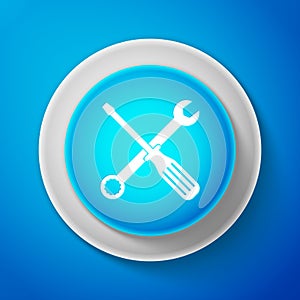White Spanner and screwdriver tools icon isolated on blue background. Service tool symbol. Circle blue button with white