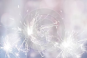 White sparkler fire for holiday festive background