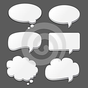 White speech bubbles set on black