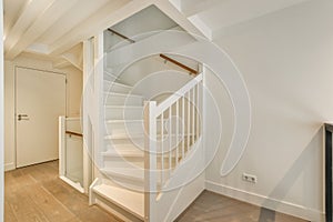 White spiral staircase in modern apartment