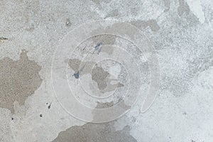 White splash on gray background concrete wall, messy, splotchy, surface. Decorative wet paint drops, abstract art. photo