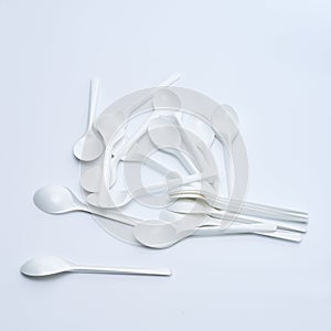 White spoon on white background