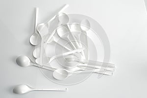 White spoon on white background