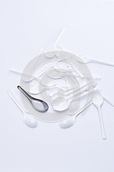 White spoon on white background