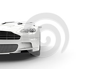 White sports car - headlight closeup