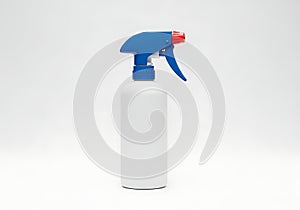 White spray bottle with blue trigger and red nozzle
