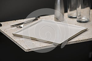 White, Square Dining Plate with Glasses, Knife, and Fork
