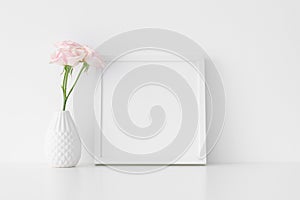 White square frame mockup with soft pink roses in a vase