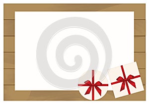 White Square Gift Box with Red Bow on Wooden Plank Background with White sheet of paper.