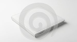 A white square object on a white surface