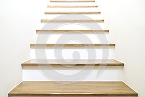 White Stairs on wood and white wall