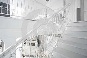 White stairway inside expensive house