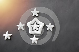 White stars are placed on a black background for business ideas