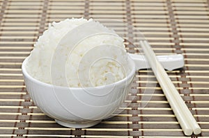 White steamed rice in ceramic bowl