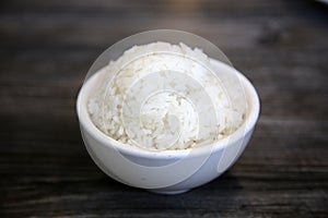 White steamed rice in a dish. Chinese Steamed Wite Rice in a white bowl. Chinese Lunch. White Rice