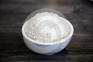 White steamed rice in a dish. Chinese Steamed Wite Rice in a white bowl. Chinese Lunch. White Rice photo