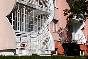 White steel balcony railing and decorative security grill