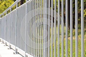 White steel fence railing