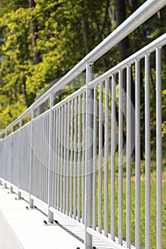 White steel fence railing