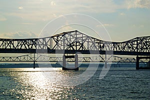 White, Steel Roadway River Bridge at Sunset