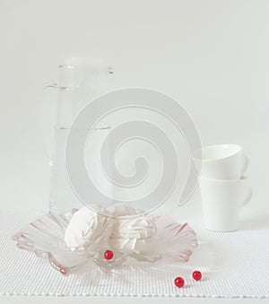 White still life in a rustic style with pastries