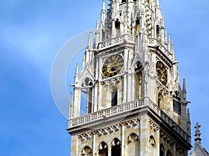 white stone church clock and bell tower detail in Zagreb