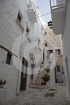 White stone houses in Polignano a Mare city with no people
